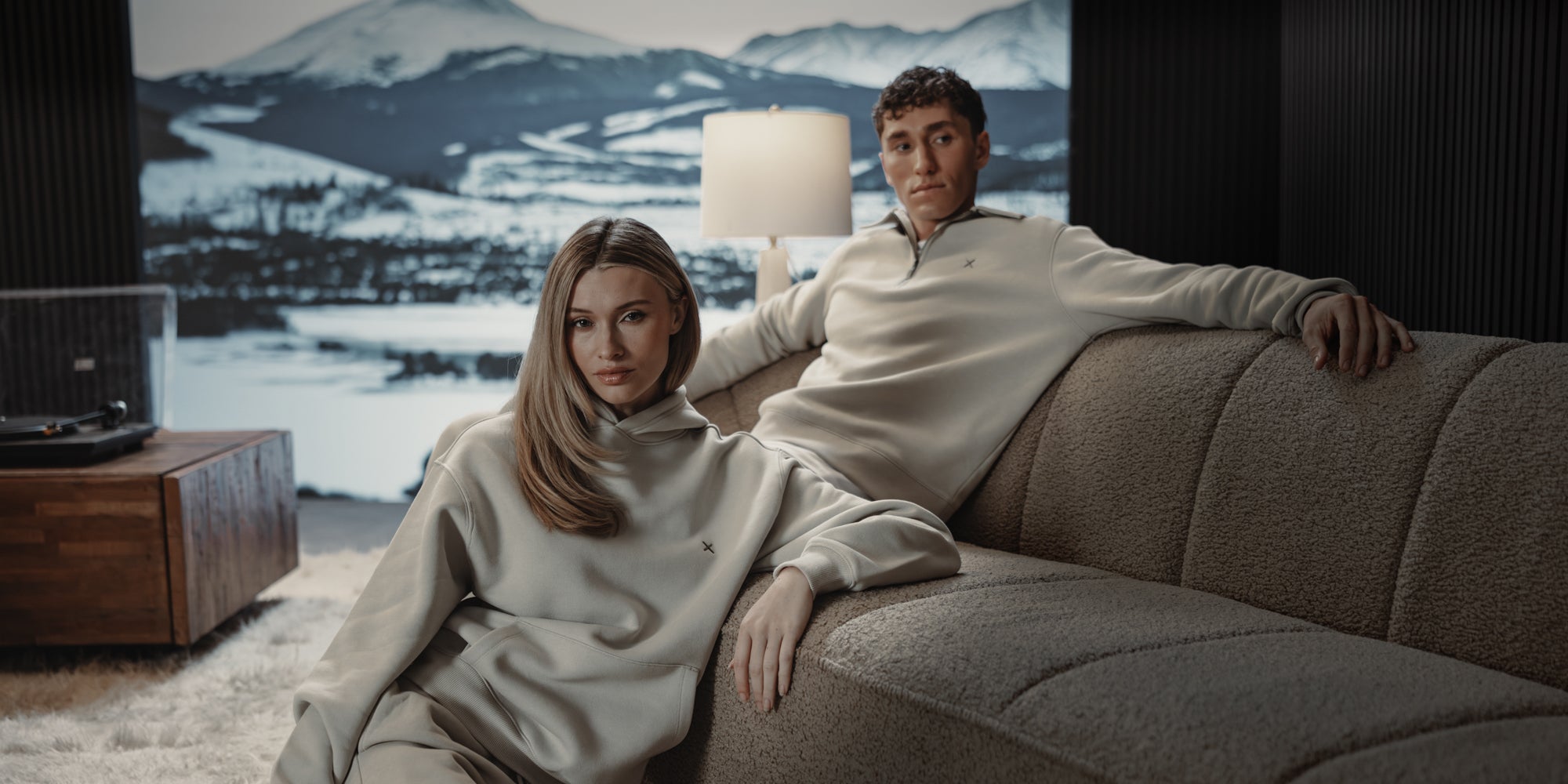 Man and woman in light fleece outfits
