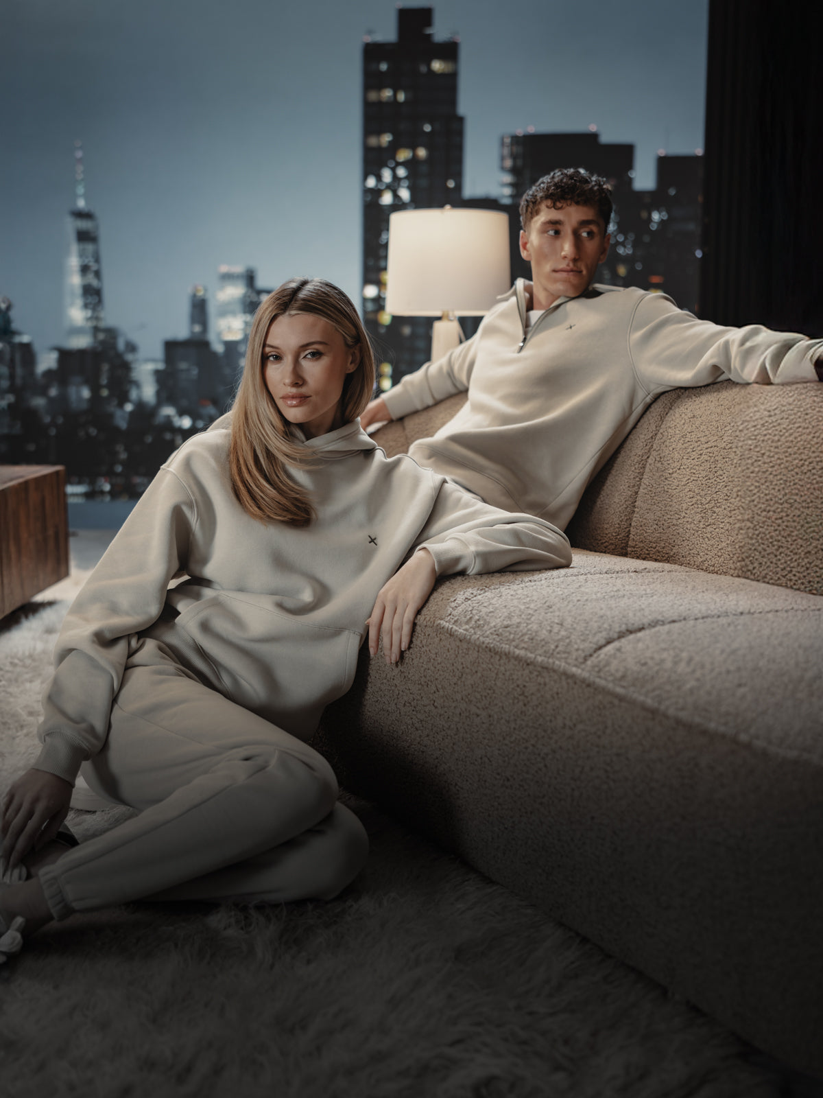 Man and woman in light fleece outfits